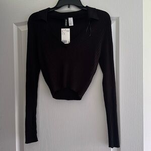 Black V-neck, ribbed, collar sweater/blouse